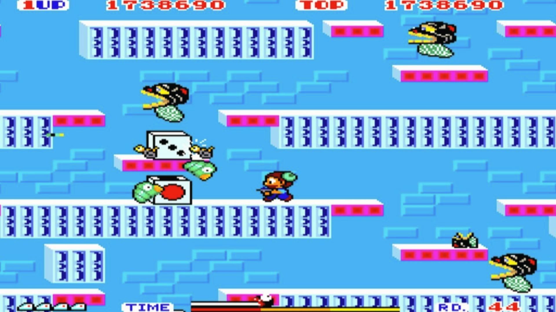 Hero dodges snakes on blue brick platforms, Psycho Fox Master System action platformer level chaos
