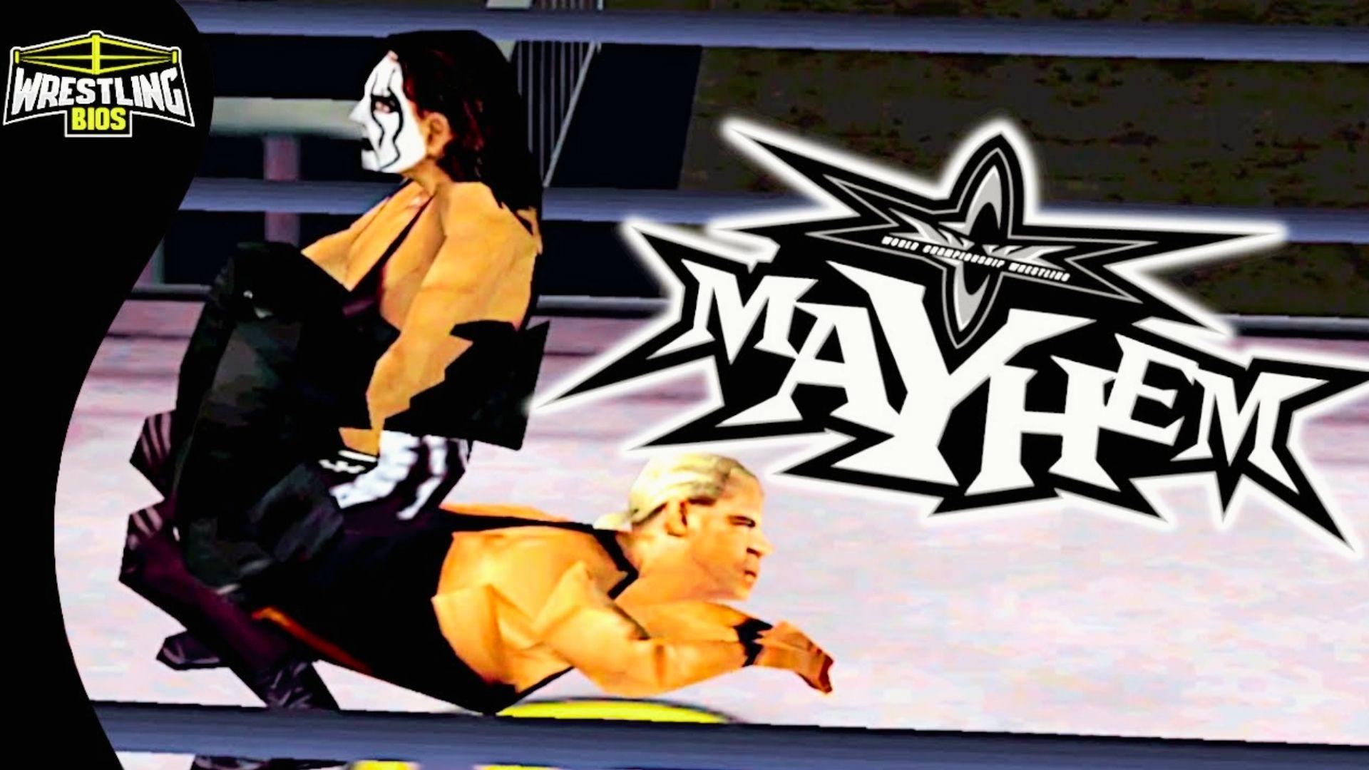 WCW Mayhem gameplay screenshot with Sting applying submission on opponent, Mayhem logo, Wrestling Bios watermark overlay