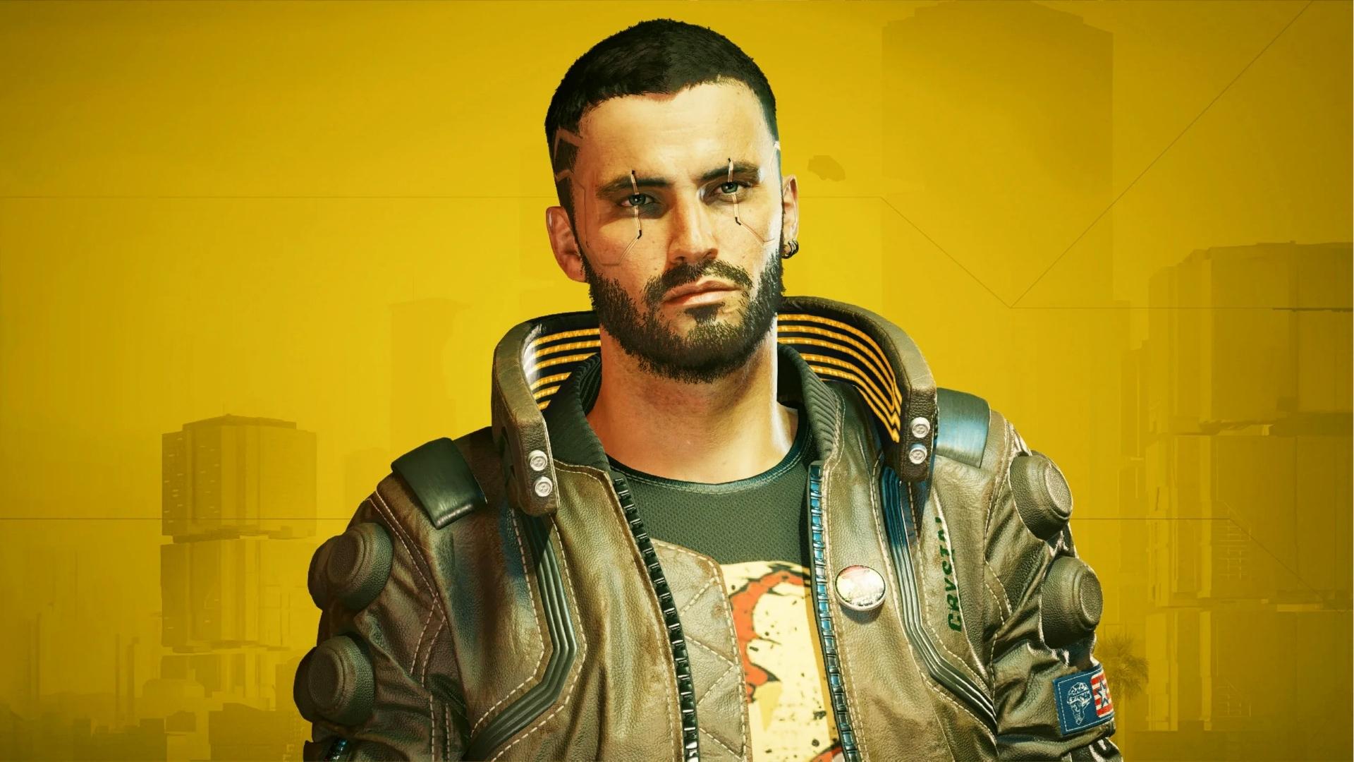 Male V with short hair, beard, and facial cyberware lines wears brown leather jacket with glowing collar against yellow Night City backdrop.
