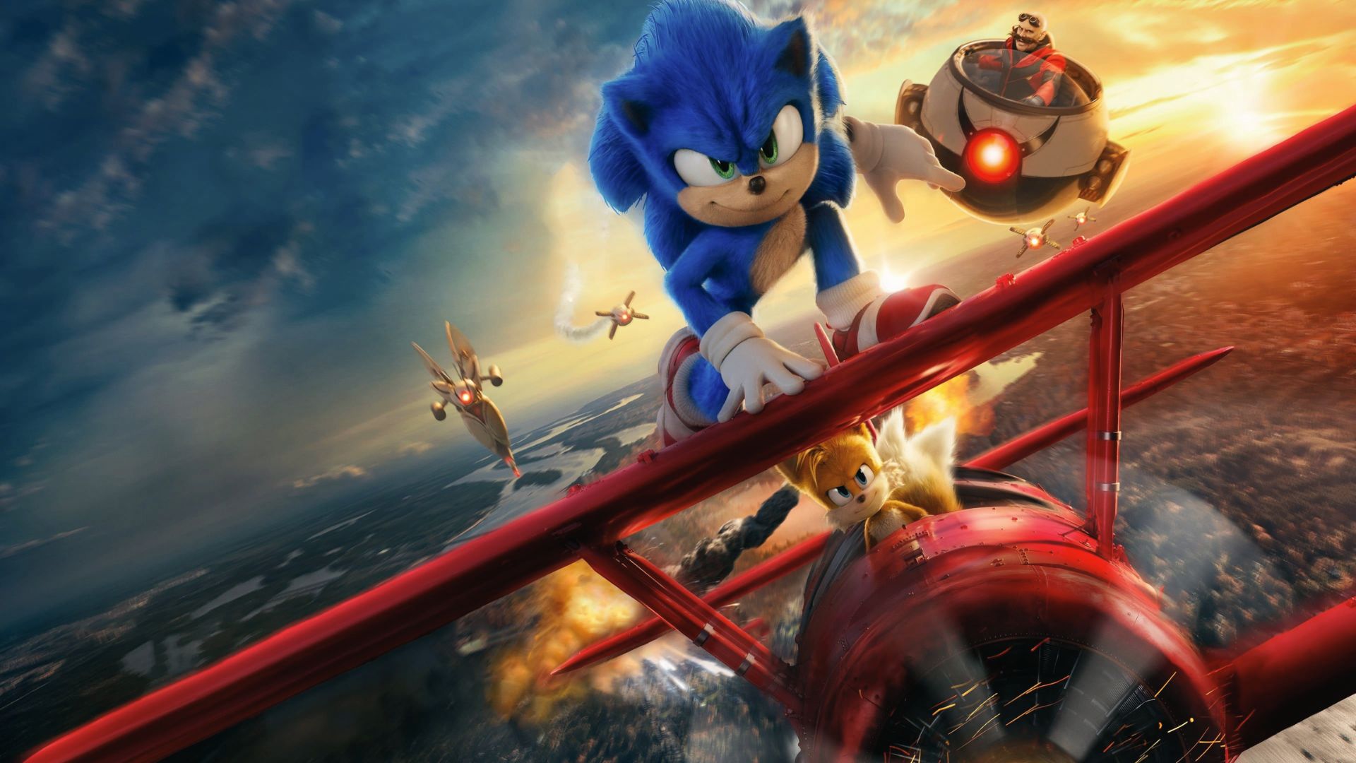 Sonic and Tails on a red biplane chased by Dr. Eggman, nod to Master System's legacy and modern era