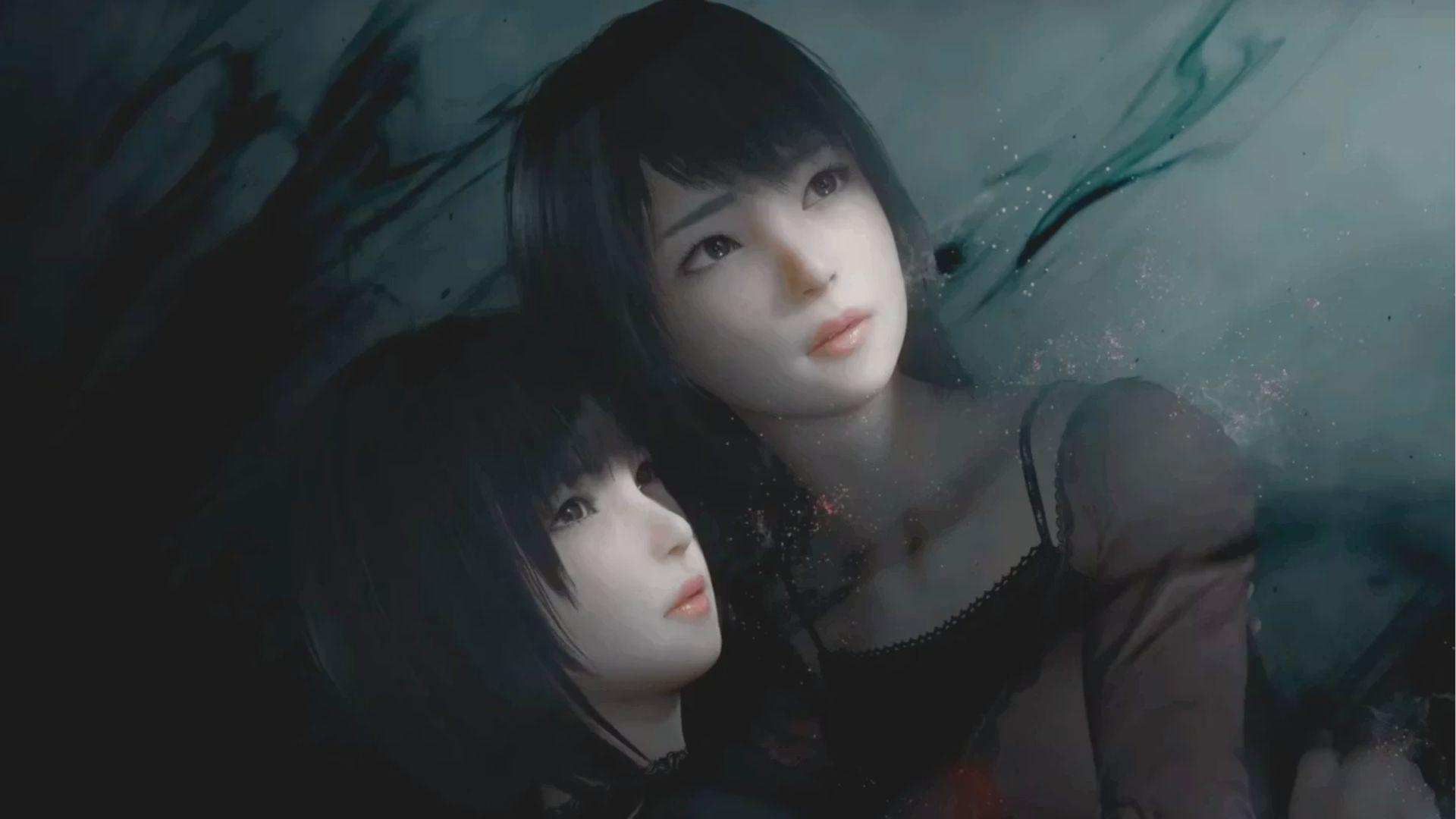 Two dark-haired women gaze upward with solemn expressions as ethereal particles swirl in shadowy water.