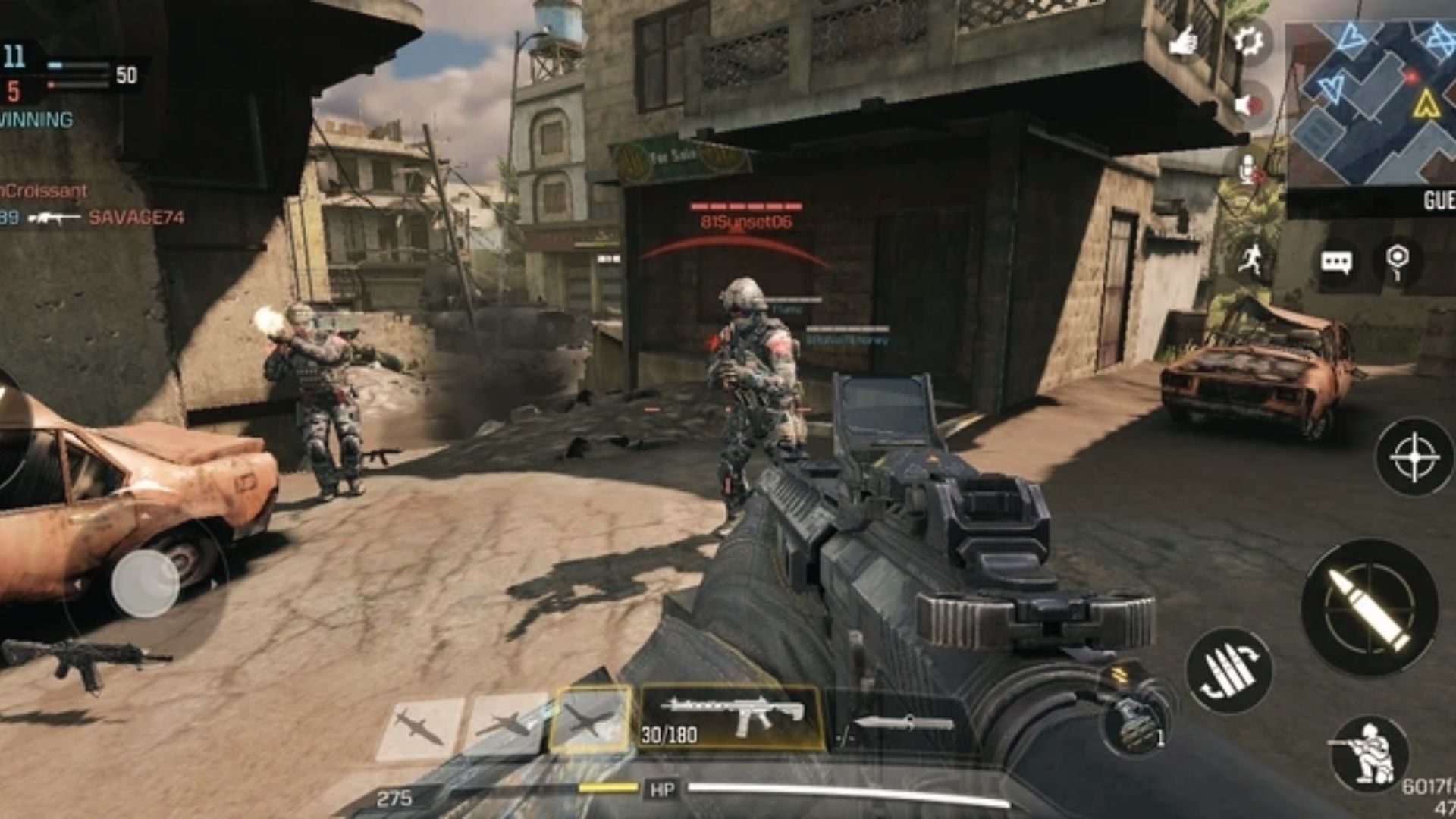 COD Mobile HUD in intense fight. Master thumb layout and sensitivity to improve aim on mobile COD.