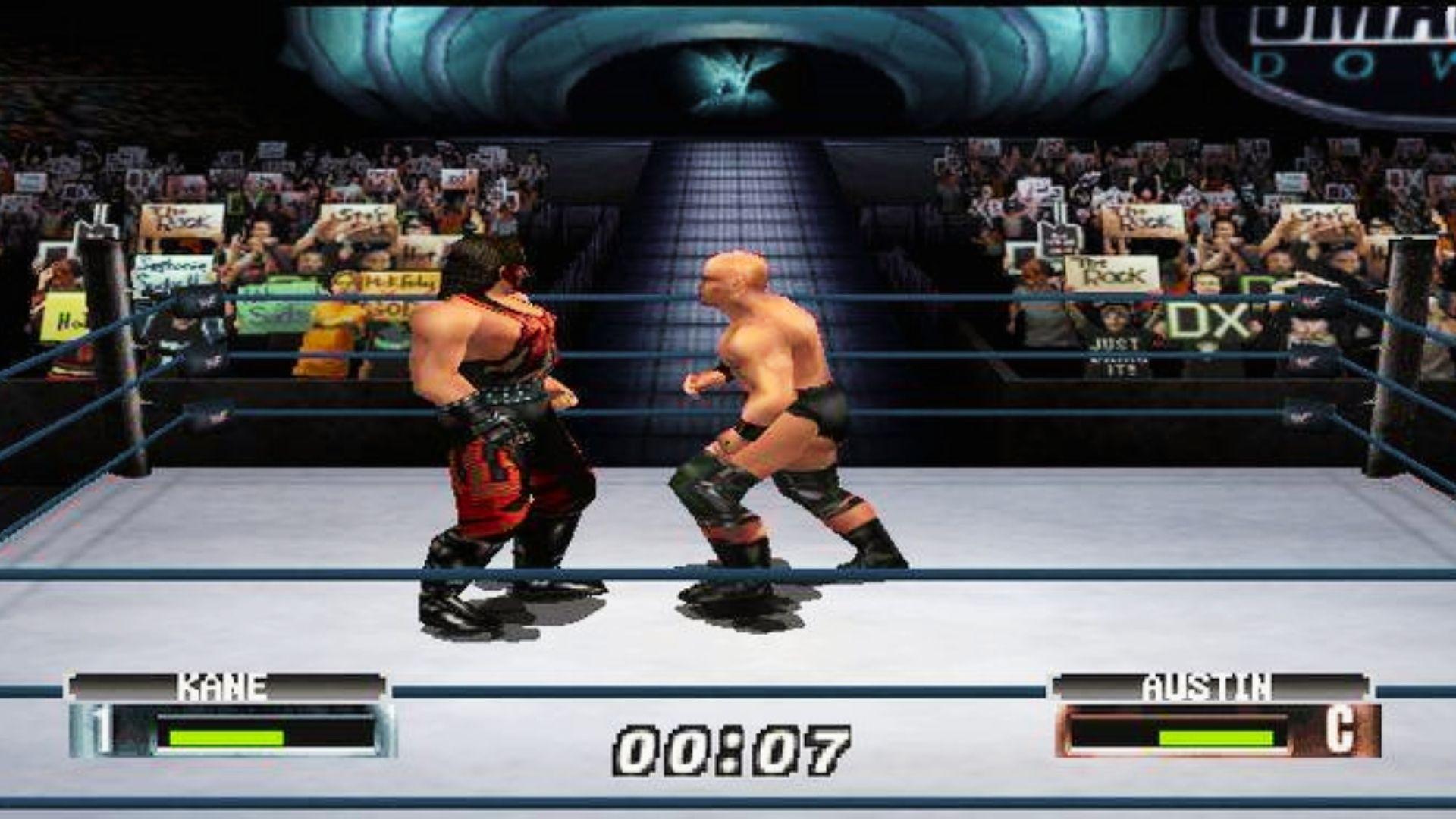 WWF wrestling game screenshot showing Kane facing Stone Cold Steve Austin in ring, crowd signs, SmackDown entrance, timer