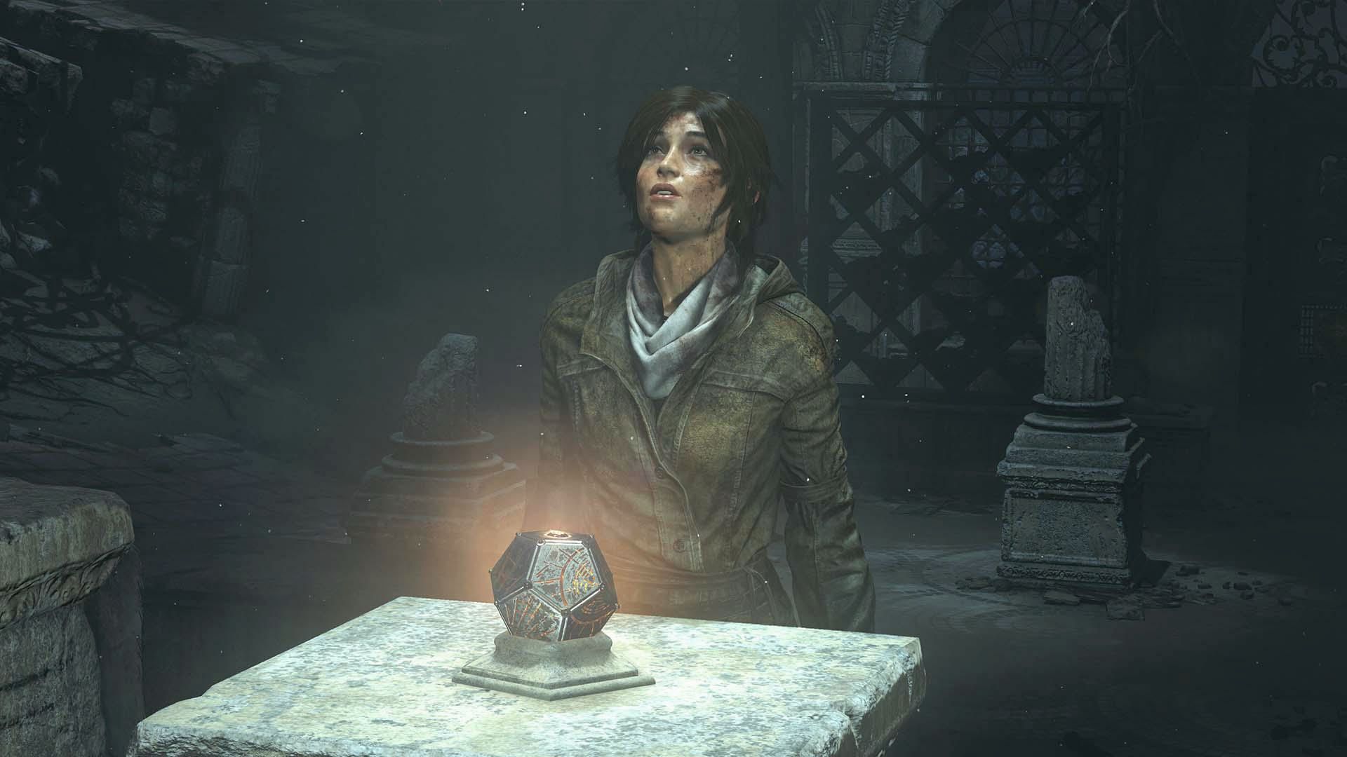 Lara gazes at a glowing artifact on a stone altar. Rise of the Tomb Raider deepens myth and mystery.