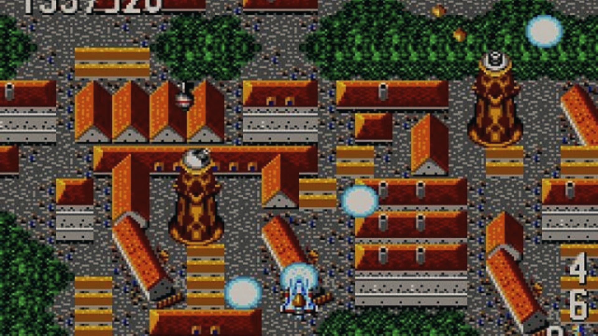 Power Strike II energy orbs over red-roofed city in vertical shooter, iconic Master System shmup action